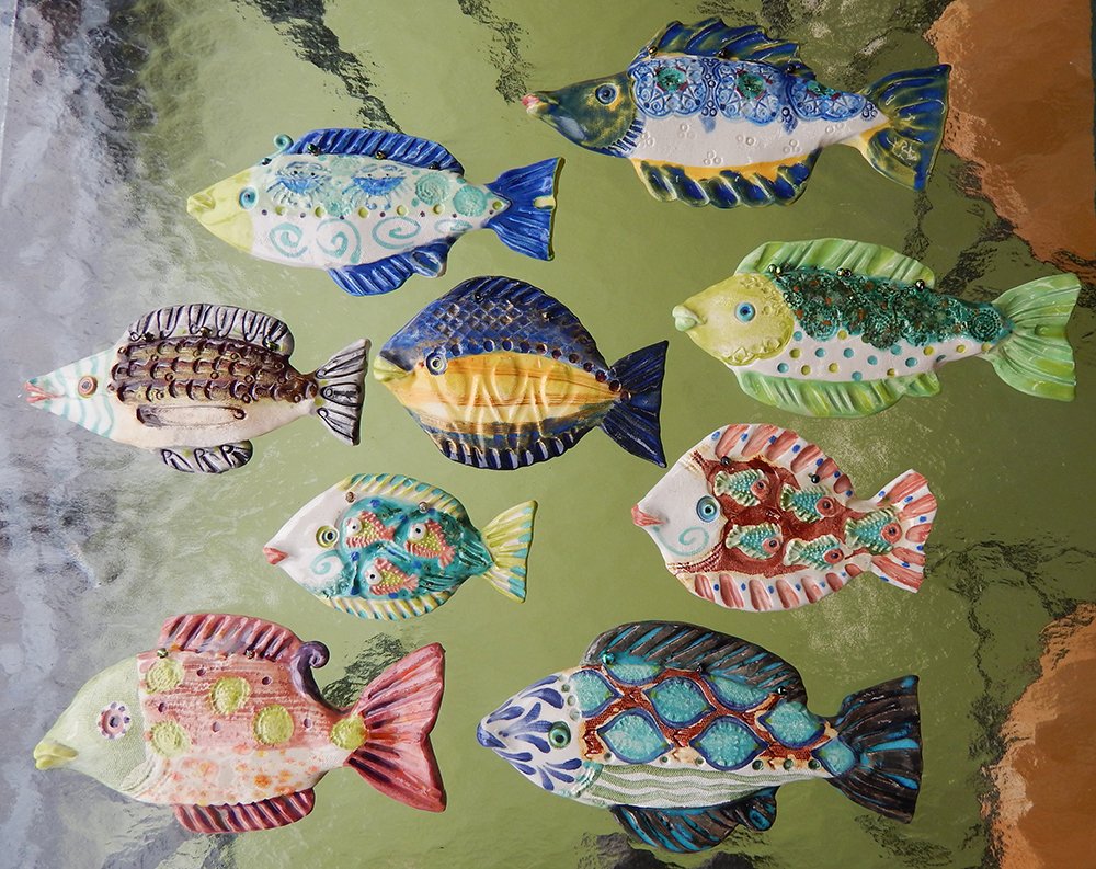 https://www.danasimson.com/wp-content/uploads/2017/01/assorted-ceramic-wall-fish-small-medium-patterned-handmade.jpg