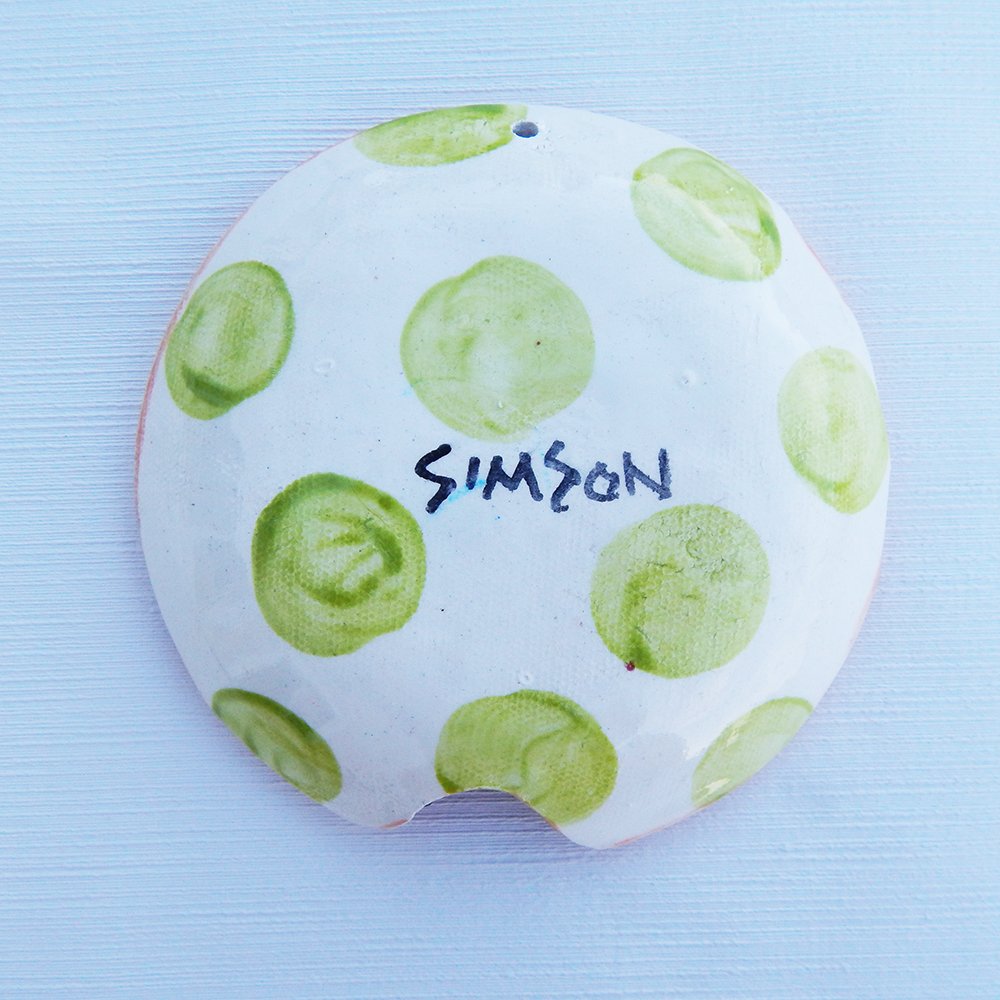 https://www.danasimson.com/wp-content/uploads/2017/08/back-spoonrest-handmade-ceramic-food-safe-signed-dana-simson.jpg